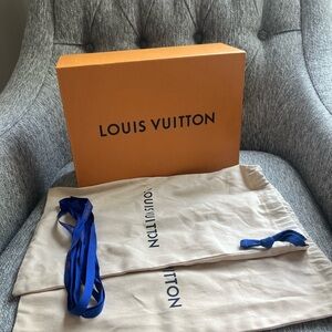 Louis Vuitton shoe box draw with shoe dust bags.